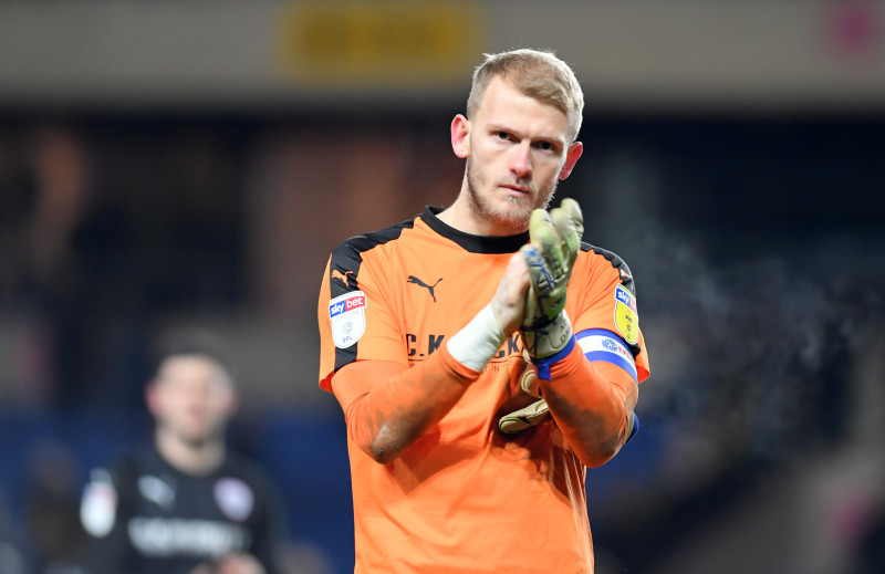 Other image for Davies thanks Toney for  helping Reds